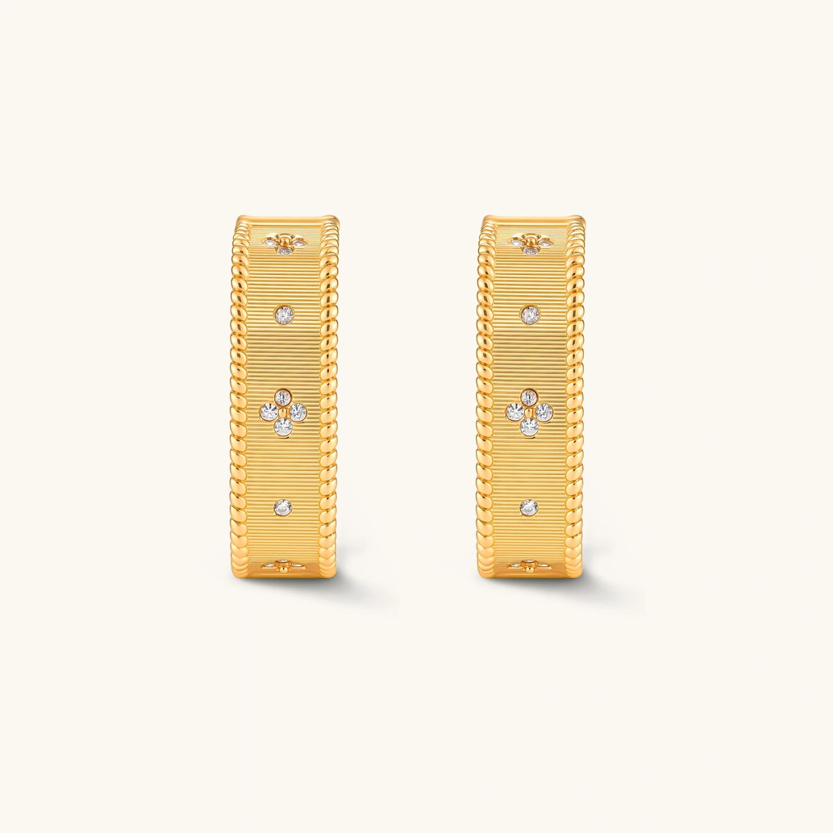 Square huggie hoop earrings in 18K gold-plated silver with ribbed texture, rope borders, floral CZ clusters, and filigree inner lace.