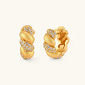 Pair of 18K gold-plated 925 silver huggie hoops with twisted braid texture and pavé cubic zirconia detailing, 15mm.